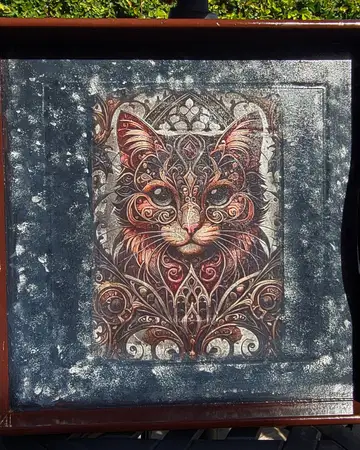 Wooden serving tray with a decorative cat panel under glass