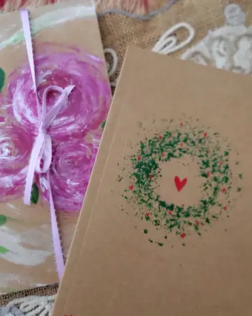 Greeting cards reproduced from original artwork, with a hand-tied bow